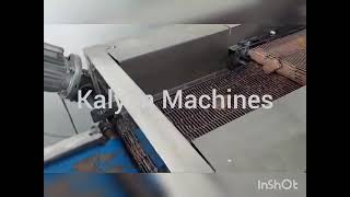center fill Protein Bar extruder With chocolate enrober.