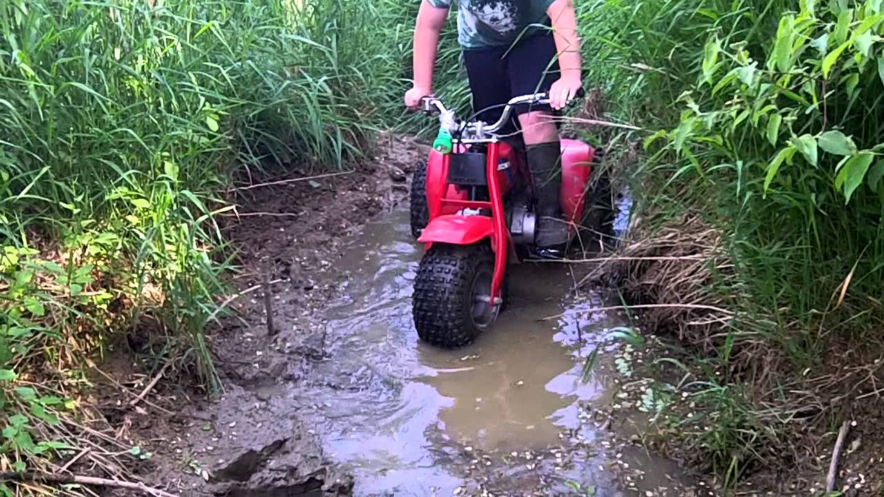 atc 70 three wheeler mudding - YouTube