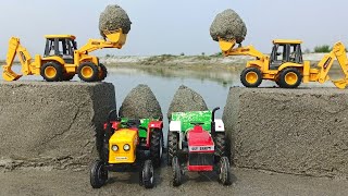 JCB 3dx and jcb4dx backhoe loading powertrac tractor and sonalika tractor trolley loading