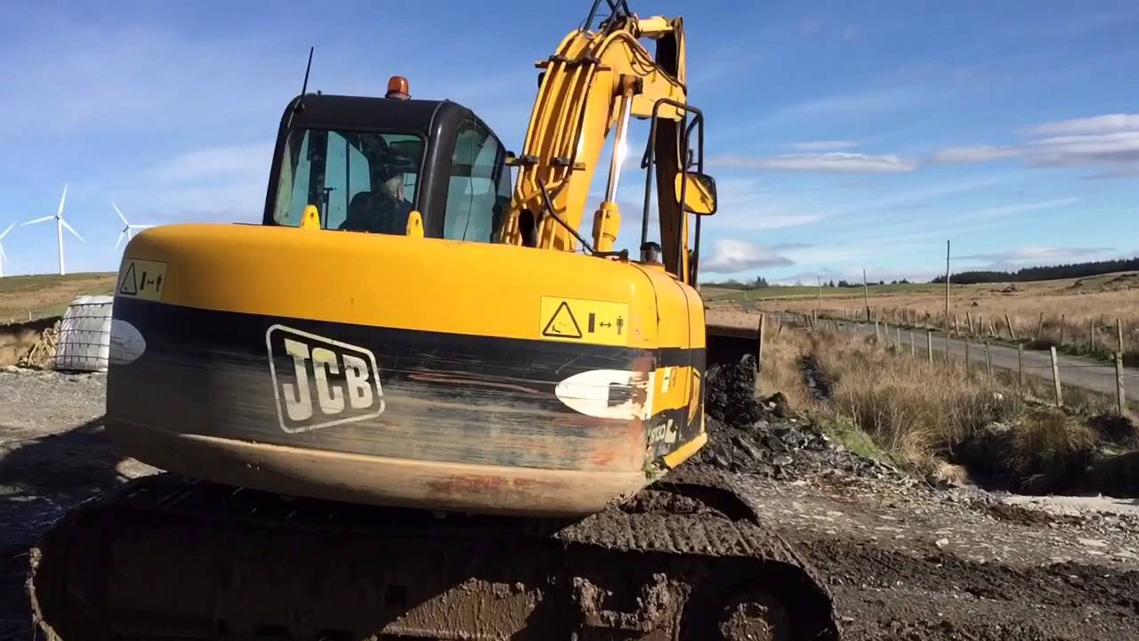 Jcb JS130 digging out rock for a new Cattle Grid