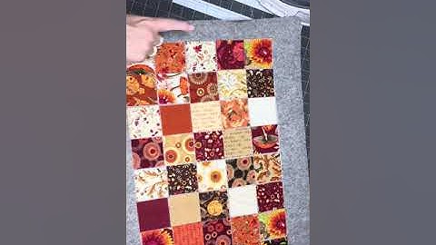 Nantucket Mini Charm Bag- Ironing fabric onto the grid.