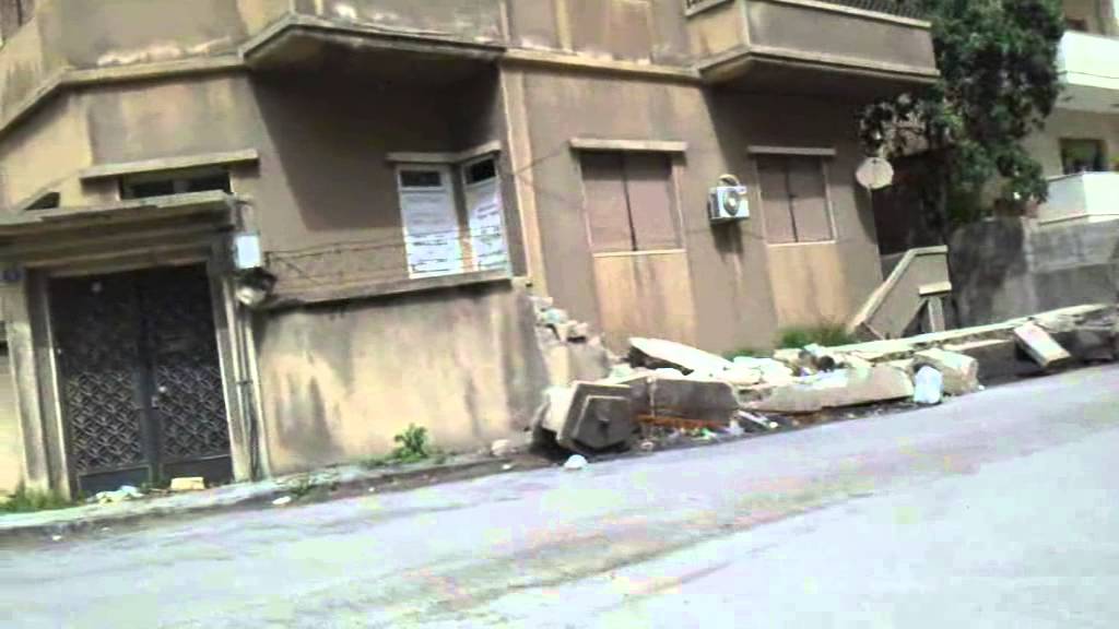 حمص 1-4-2013 جولة بمنطقة الدبلان بعد 17 شهر من الإغلاق التام وسرقة ونهب محلاتها وبيوتها