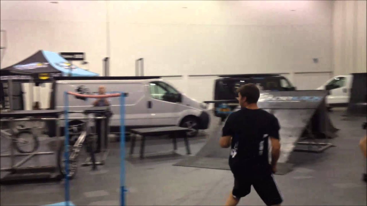 Pip Trix landing a huge feetfirst high jump at the RideLondon 2013