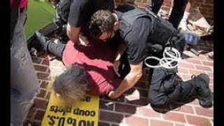 #Code Pink Activists Clash at the Embassy Multiple Arrested