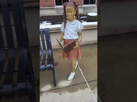 Statues Of Grandparents Holding Books Are A Wonderful Idea For A Monument
