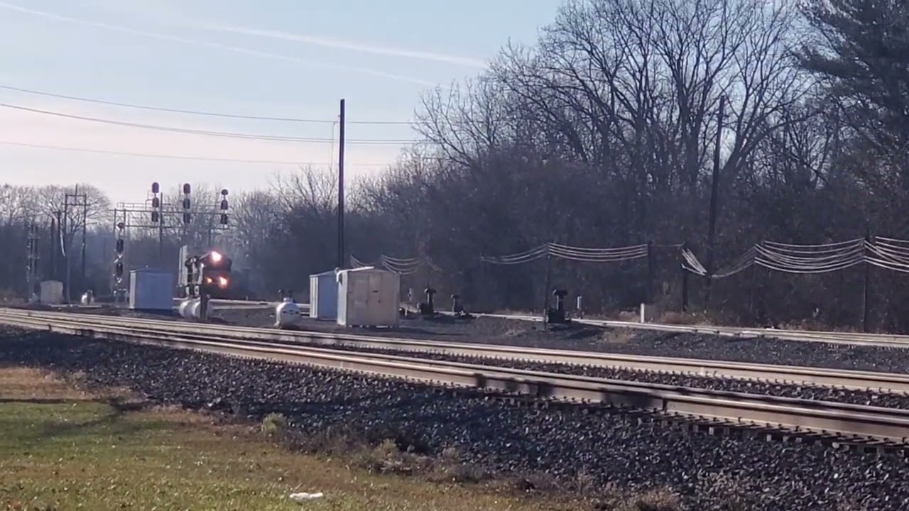 Norfolk southern 4291 and NS 4015. 4291 honking the horn.