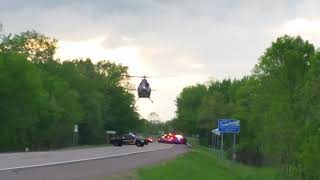 LifeLink 3 Medical Helicopter landing/departing from accident scene with teenager after fatal crash