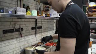 Ukrainian Business Owners In Frontline City Of Kramatorsk Keep Their Doors Open For Customers