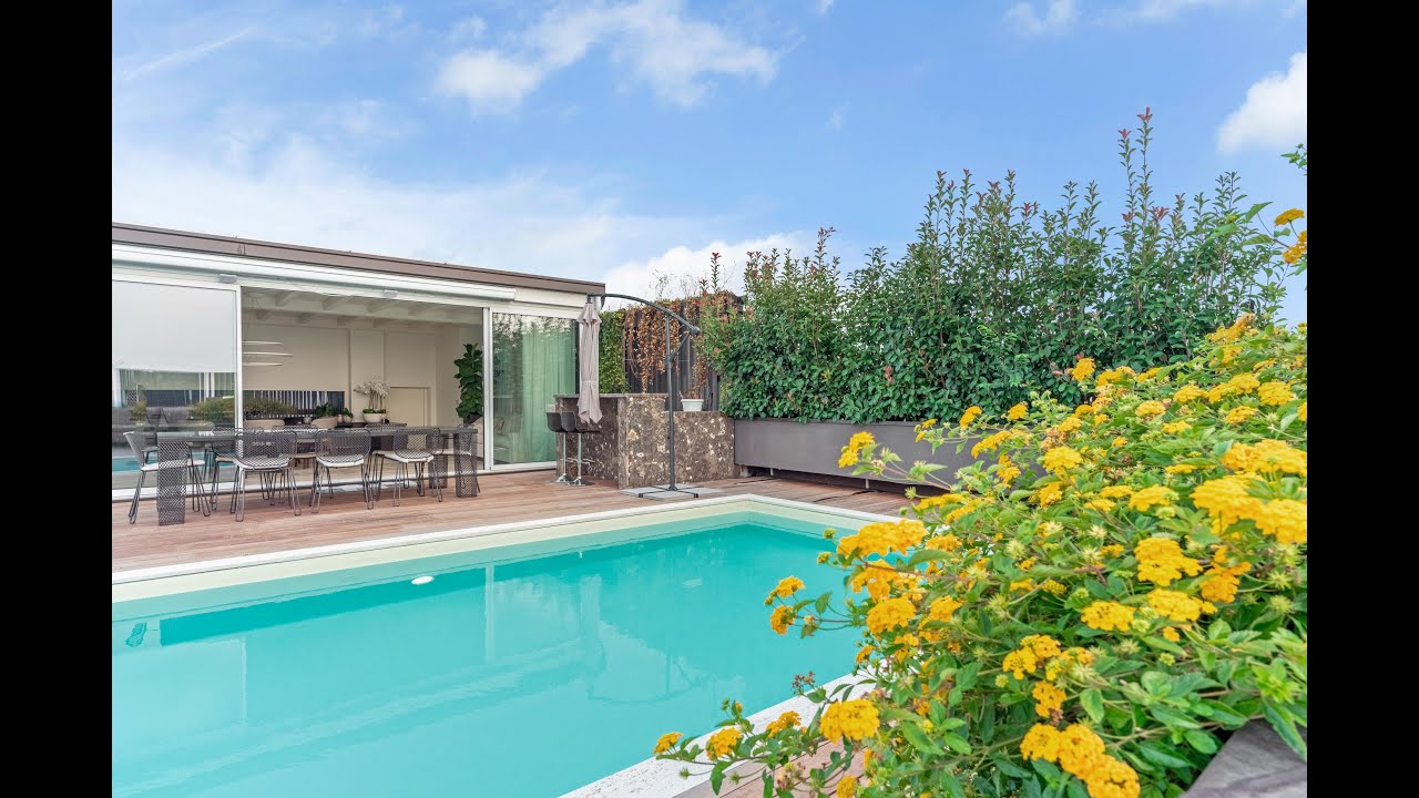 ESCLUSIVO ATTICO CON PISCINA SUL TERRAZZO