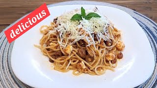 Spaghetti in Tomato Sauce, Olives and Feta Cheese.