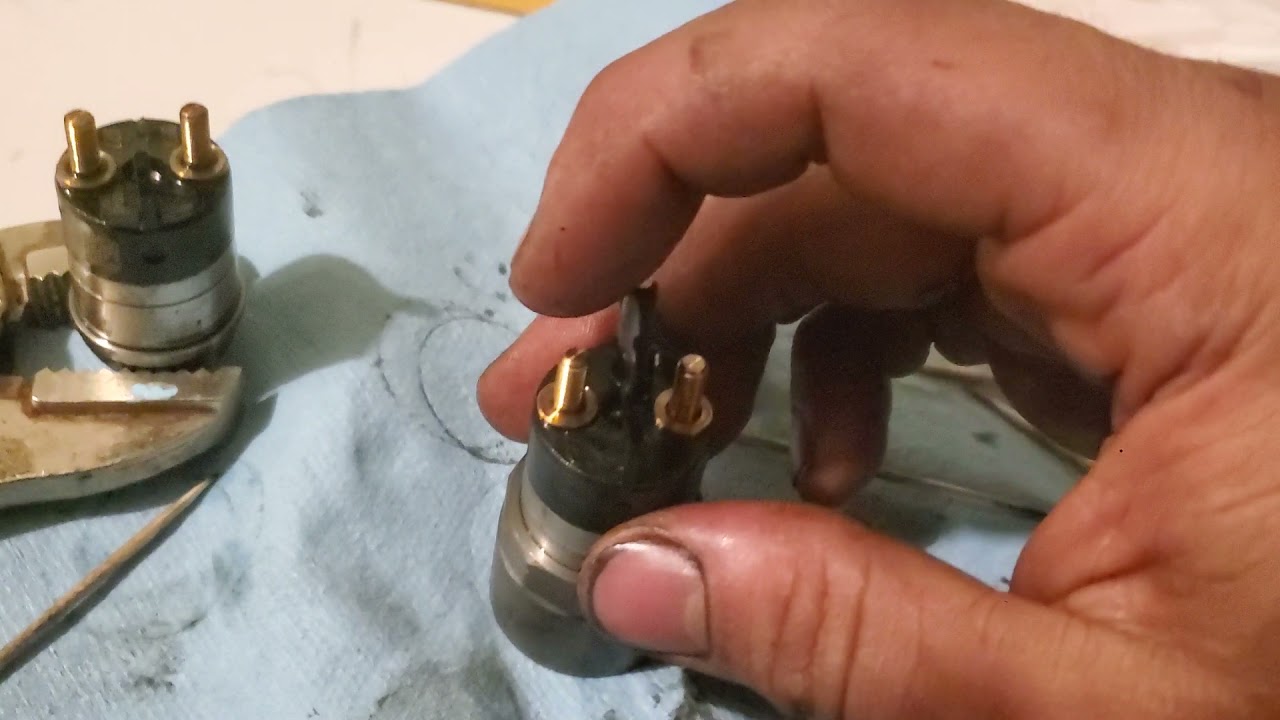 24v 5.9 cummins injector solenoid disassembly