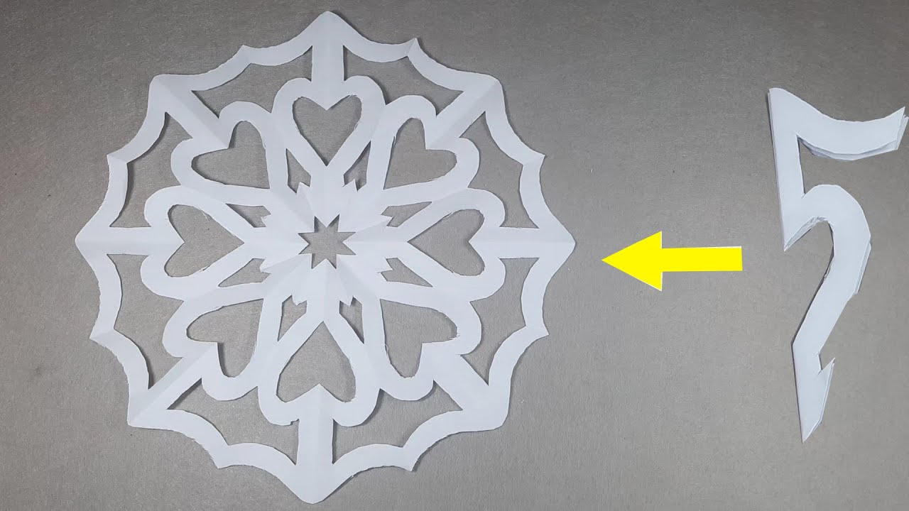 Paper Snowflakes How to make a heartshaped snowflake out of paper