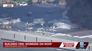 Future West Allis DPW building inferno: Workers on roof at one point