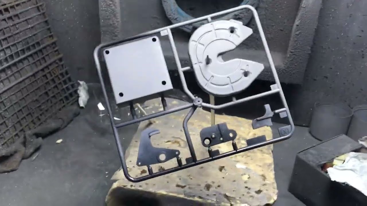 Applying plastic primer spray can on tamiya 1/14 truck parts