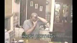 Pulls condom over head and blows it up