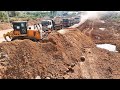 Amazing opening new project bulldozer pushing soil with 25t dump trucks waiting loading soil