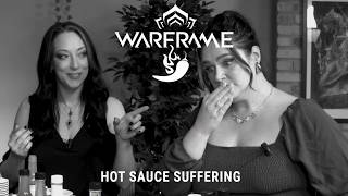 Amelia Tyler and Elsie Lovelock eat hot sauce