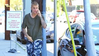 Justin Bieber Takes An Uber To The Studio, Tells Paparazzo 'Don't Smile And Laugh At Me'