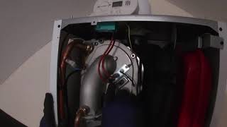 Ian explains to Marcus the parts inside a combination boiler