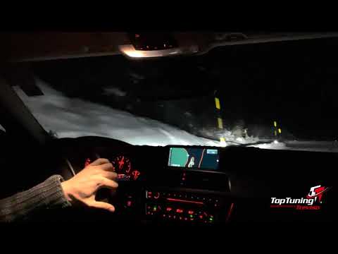 Drifting through a snowed Passo Val Parola in a Bmw Alpina D3 Touring RWD