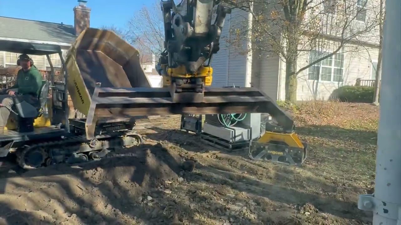 Tiltrotator using a grade beam