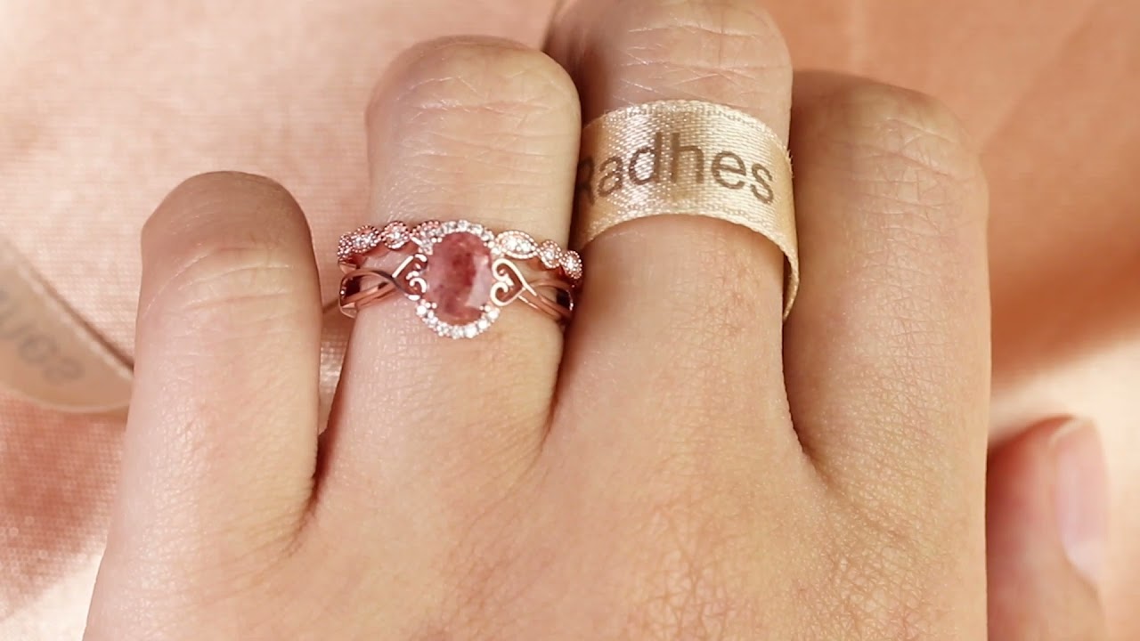 8x6mm Oval Cut Strawberry Quartz and Diamond Twisted Heart Shank Semi-halo Bridal Ring