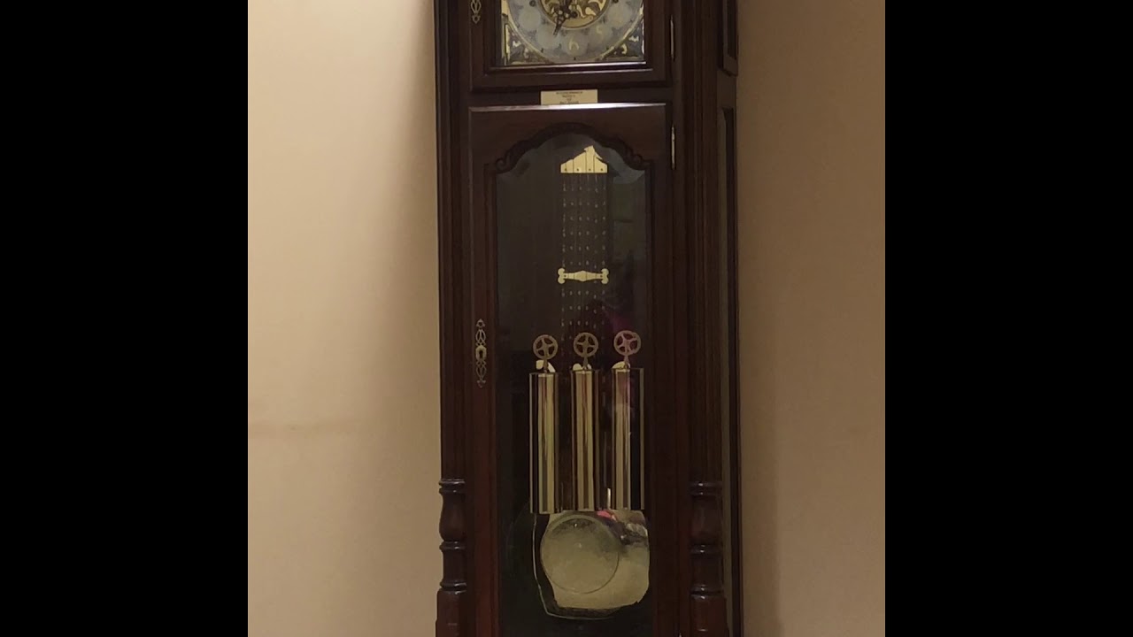 Grandfather clock watching - YouTube