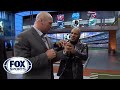 Mike Tyson gives Brian Urlacher boxing lessons