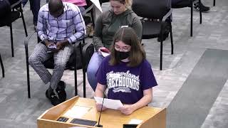 Me speaking at my HISD book meeting about flamer