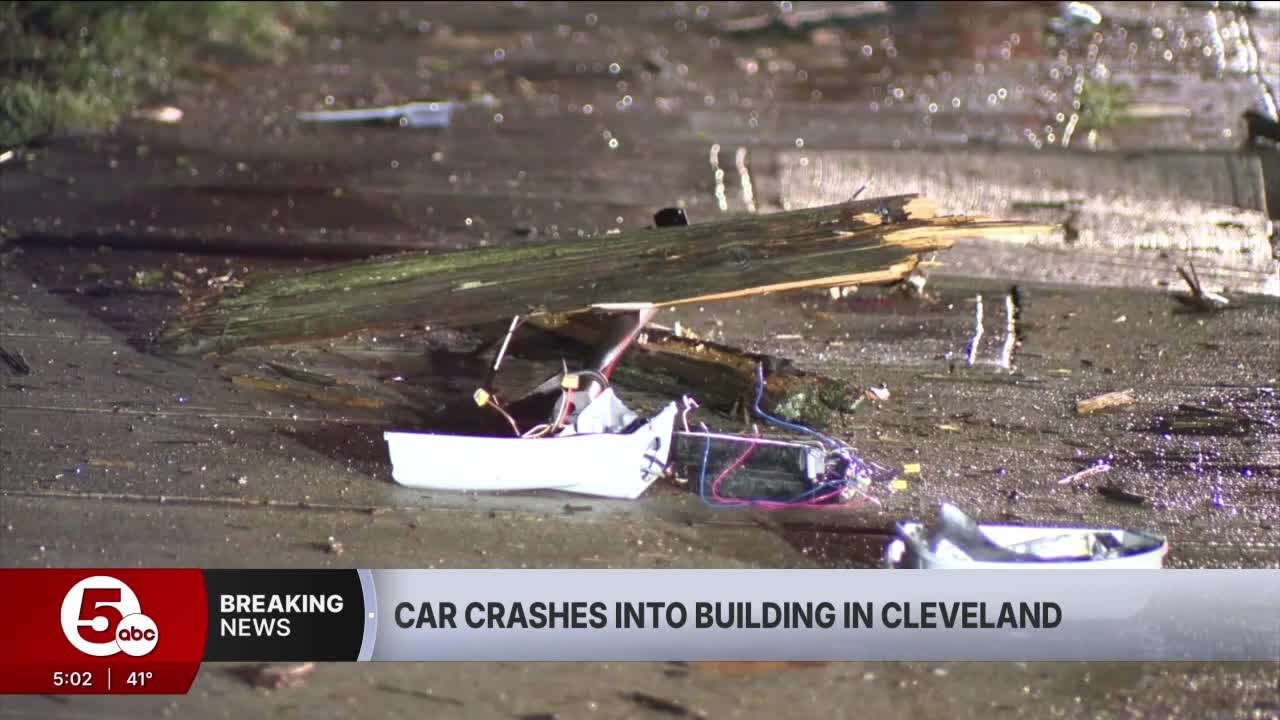 Car crashes into building - YouTube