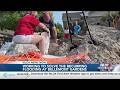 Bellemont Gardens residents fill sandbags, work to solve flooding problems