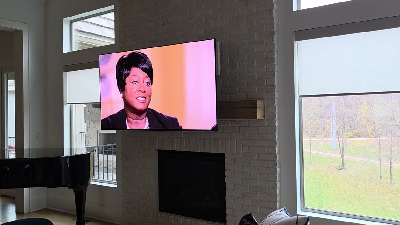 65 inch 65sl90 on a motorized mantle mount attached to real bick