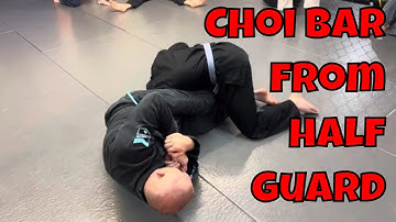 Double armlock attack from half guard(Choi bar)