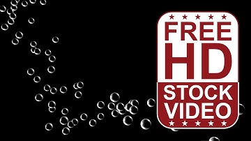 Free Stock Videos – abstract animated 3D particle spheres falling and bouncing on black back