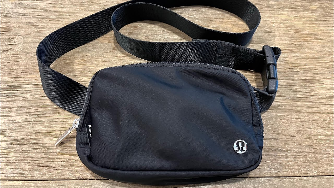 black lululemon belt bag with gold Lululemon Black Waist Purse NWT Lululemon Everywhere Belt Bag 1L Black Gold  NWT LU9AX2S