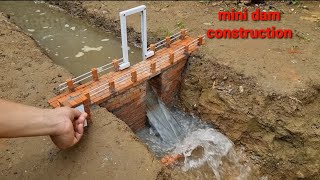 mini dam construction [ with bricks ]