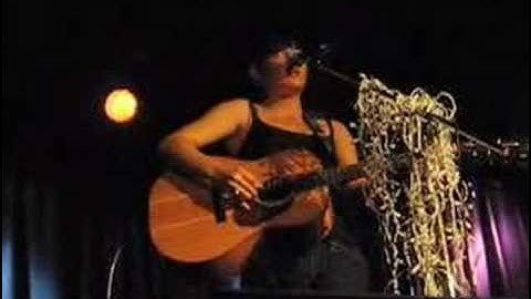 Lisa Mitchell,singing "Incomplete Lullaby"