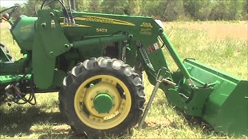 Removing and re-attaching John Deere 553 Loader