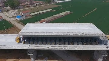 How gigantic high-speed railway girders are laid