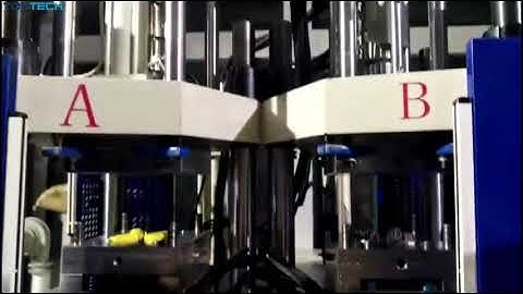 Rotary table double color vertical injection molding machine