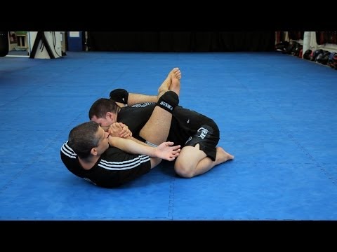 How to Do Kimura from Triangle Choke Hold | MMA Submissions