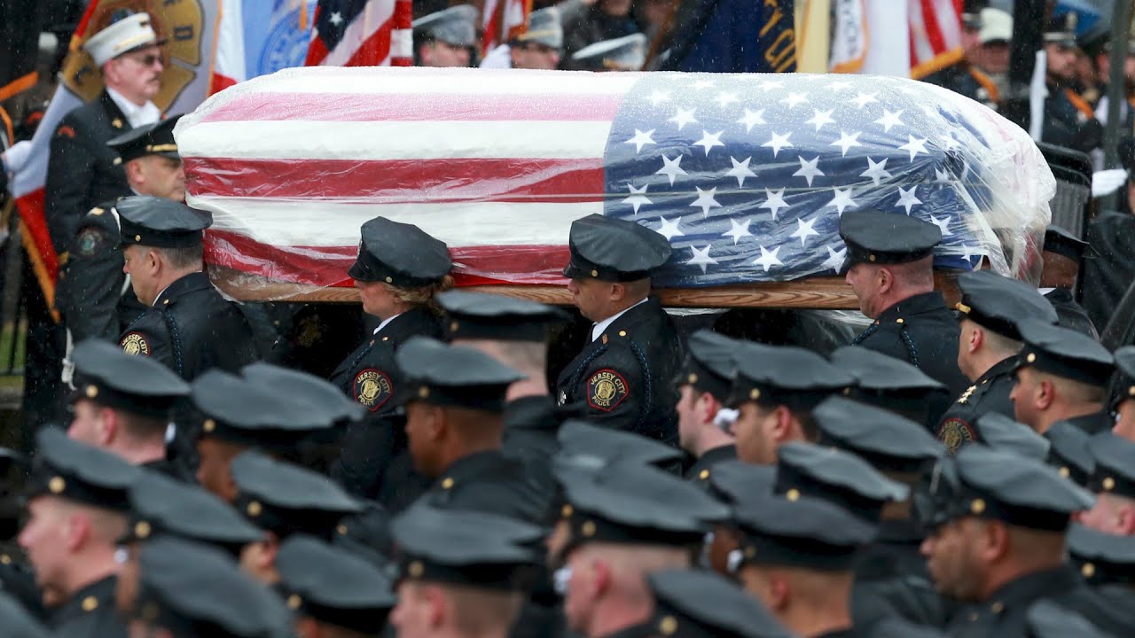 Thousands gather at funeral for detective killed in Jersey City