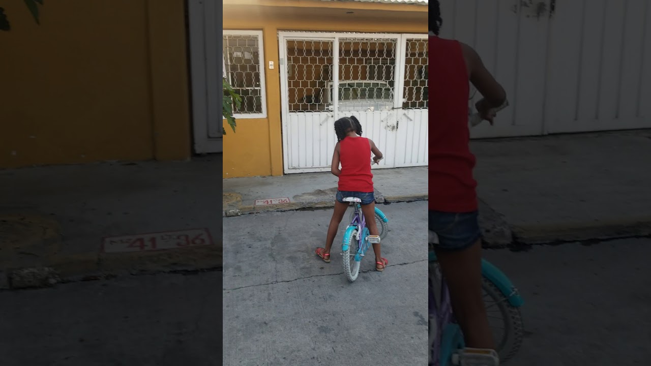 Learning how to ride a bike without training wheels YouTube