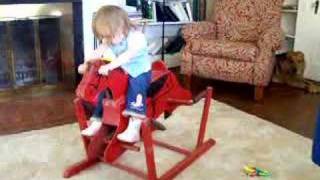 Grandma Miller and Aunt Sally brought over this antique spring loaded red rocking horse. How nice!!! Yea-Haw!!!