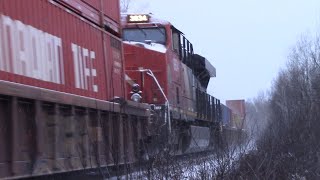 Big Stack Train CN 121 w/DPU Climbing the Hill at Berry Mills, NB in Light Snow