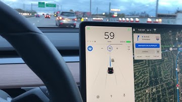 Tesla Navigate on Autopilot slowing to let a car merge!
