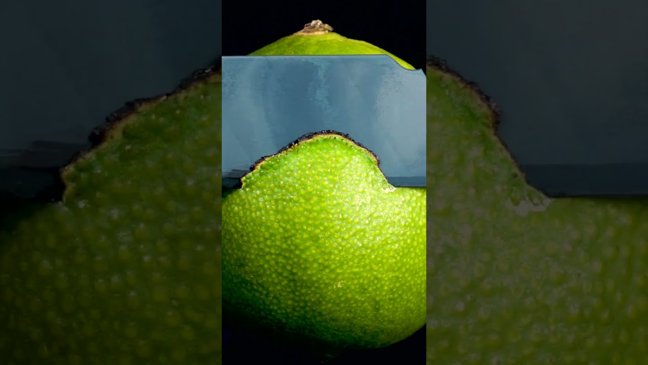Cutting a Lime with Hot Knife Close-Up