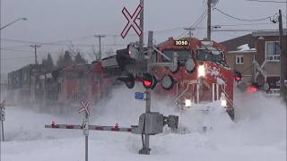 Dashing thru the Snow! Long Stack Train CN 120 rolling thru Downtown Moncton, NB after Snow Storm