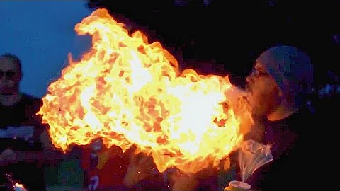 Fire Breathing in Slow Motion (Corn Starch) | Slow Mo Lab