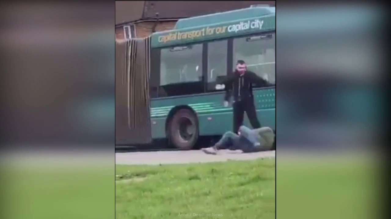 Bus driver jumps out of window and throws passenger to ground following "smack talk" YouTube
